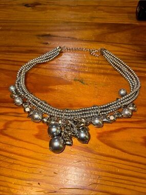 Statement Silver-Tone Multi-Row Beaded Necklace with Charm Drops